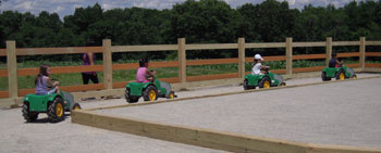 Future Farmers having fun at Farmer Mark's Tractor Training Course at Parlee Farms